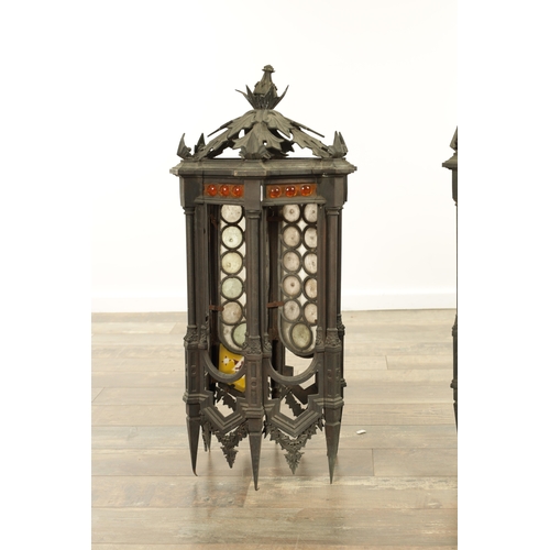 642 - A PAIR OF LATE 19TH CENTURY BRONZE GOTHIC STYLE HANGING LANTERNS the hexagonal shaped bodies with sp... 