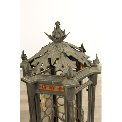 642 - A PAIR OF LATE 19TH CENTURY BRONZE GOTHIC STYLE HANGING LANTERNS the hexagonal shaped bodies with sp... 