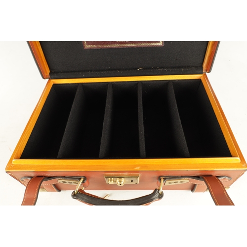 646 - A JOHN RIGBY & CO. PALL MALL LONDON LEATHER AND OAK CARTRIDGE CASE, having brass mounted corners and... 