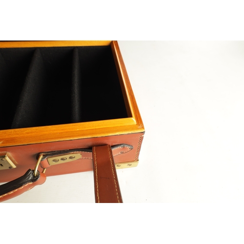 646 - A JOHN RIGBY & CO. PALL MALL LONDON LEATHER AND OAK CARTRIDGE CASE, having brass mounted corners and... 