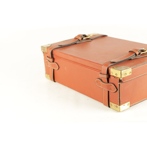 646 - A JOHN RIGBY & CO. PALL MALL LONDON LEATHER AND OAK CARTRIDGE CASE, having brass mounted corners and... 