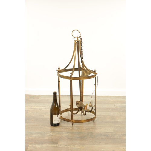 647 - A 20TH CENTURY BRASS HANGING LANTERN of circular form with splayed hanging brackets (81cm high )