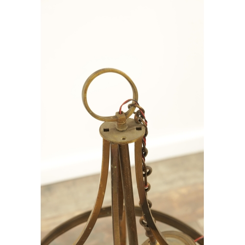 647 - A 20TH CENTURY BRASS HANGING LANTERN of circular form with splayed hanging brackets (81cm high )