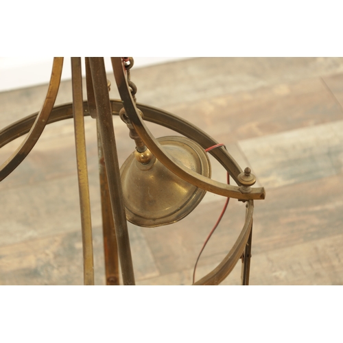 647 - A 20TH CENTURY BRASS HANGING LANTERN of circular form with splayed hanging brackets (81cm high )