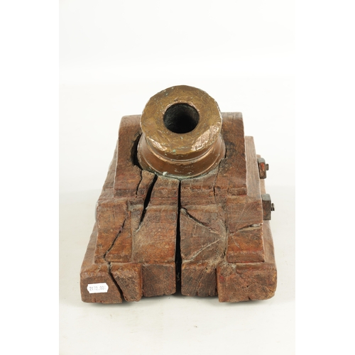 665 - AN 18TH CENTURY BRONZE MORTAR CANON STAMPED M MAVRIER DATED 1753 with coat of arms mounted on a cont... 