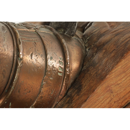 665 - AN 18TH CENTURY BRONZE MORTAR CANON STAMPED M MAVRIER DATED 1753 with coat of arms mounted on a cont... 