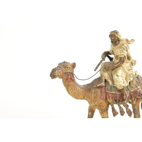 670 - A 20TH CENTURY AUSTRIAN COLD PAINTED BRONZE SCULPTURE BY FRANZ BERGMAN depicting a camel and his rid... 