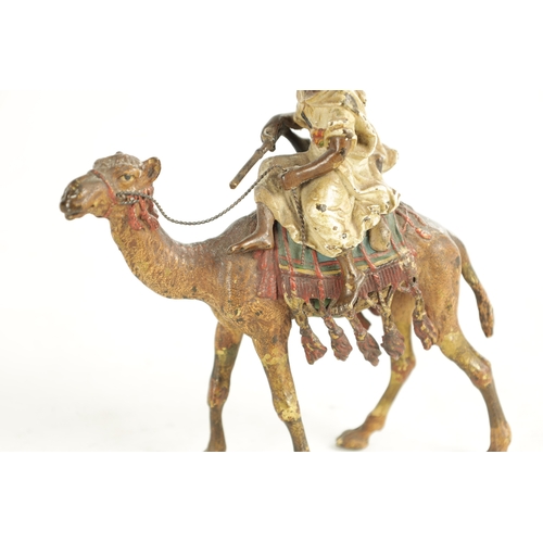 670 - A 20TH CENTURY AUSTRIAN COLD PAINTED BRONZE SCULPTURE BY FRANZ BERGMAN depicting a camel and his rid... 