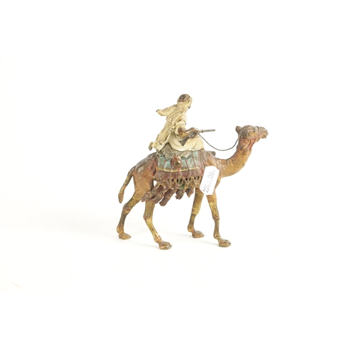 670 - A 20TH CENTURY AUSTRIAN COLD PAINTED BRONZE SCULPTURE BY FRANZ BERGMAN depicting a camel and his rid... 