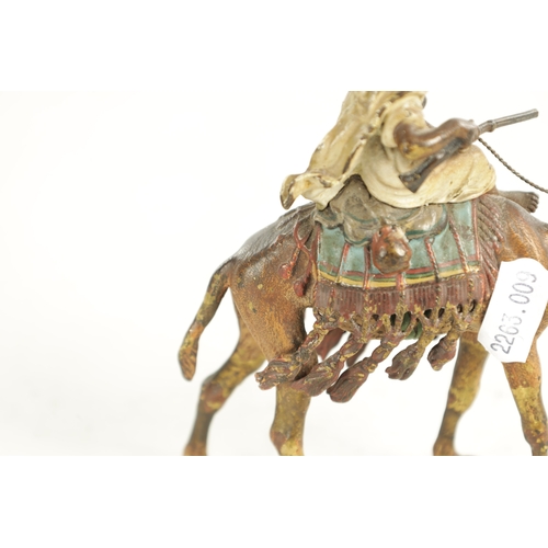 670 - A 20TH CENTURY AUSTRIAN COLD PAINTED BRONZE SCULPTURE BY FRANZ BERGMAN depicting a camel and his rid... 