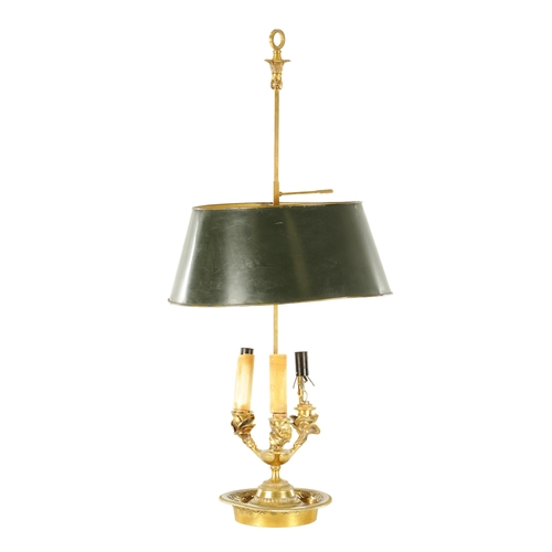 672 - A 20TH CENTURY BRASS TABLE LAMP with adjustable painted shade (76cm high)