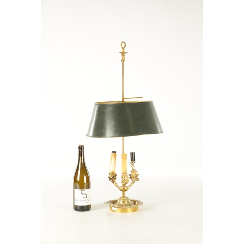 672 - A 20TH CENTURY BRASS TABLE LAMP with adjustable painted shade (76cm high)