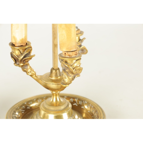 672 - A 20TH CENTURY BRASS TABLE LAMP with adjustable painted shade (76cm high)