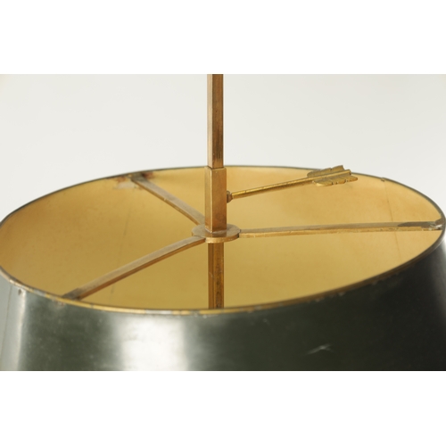 672 - A 20TH CENTURY BRASS TABLE LAMP with adjustable painted shade (76cm high)