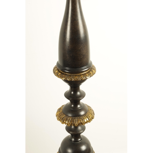 678 - AN IMPRESSIVE PAIR OF 19TH CENTURY BRONZE AND GILT BRONZE TORCHERE STANDARD LAMPS the dished tops wi... 