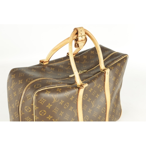 681 - A GENUINE LOUIS VUITTON SIRIUS TRAVEL BAG, with leather straps and monogrammed decoration. (43cm wid... 