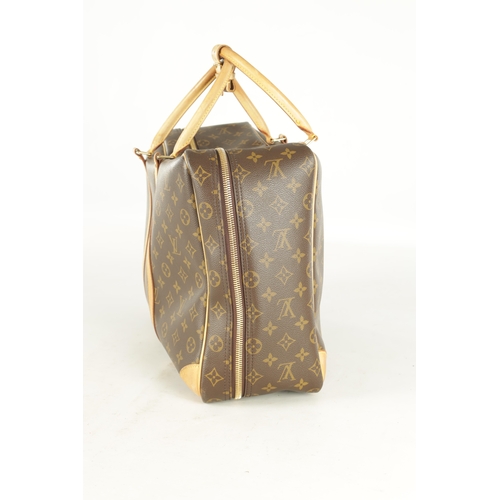 681 - A GENUINE LOUIS VUITTON SIRIUS TRAVEL BAG, with leather straps and monogrammed decoration. (43cm wid... 