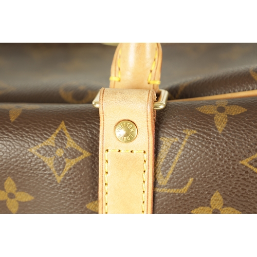 681 - A GENUINE LOUIS VUITTON SIRIUS TRAVEL BAG, with leather straps and monogrammed decoration. (43cm wid... 