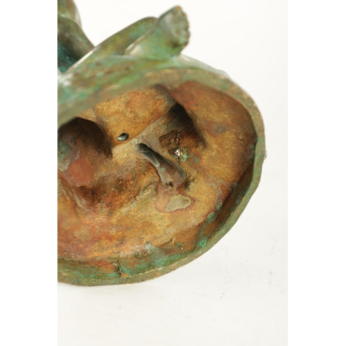 686 - A 20TH CENTURY FRENCH GREEN-PATINATED EROTIC BRONZE SCULPTURE depicting lovers (24cm high)