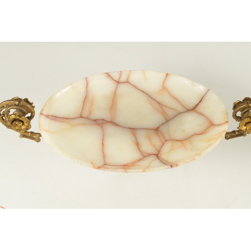 691 - A LATE 19TH CENTURY FRENCH GILT ORMOLU AND VEINED WHITE ONYX TAZZA OF AESTHETIC DESIGN with bamboo o... 