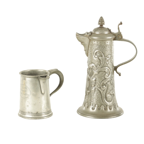 693 - AN ARTS AND CRAFTS PEWTER EWER with embossed leaf work sides TOGETHER WITH A GEORGIAN PEWTER QUART B... 