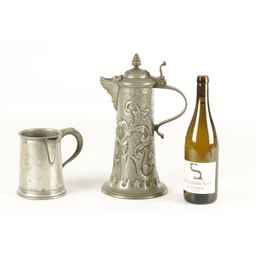 693 - AN ARTS AND CRAFTS PEWTER EWER with embossed leaf work sides TOGETHER WITH A GEORGIAN PEWTER QUART B... 