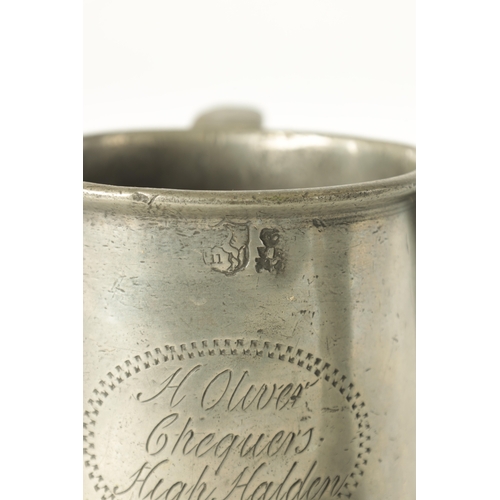 693 - AN ARTS AND CRAFTS PEWTER EWER with embossed leaf work sides TOGETHER WITH A GEORGIAN PEWTER QUART B... 