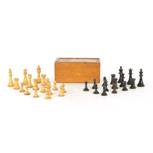 694 - A COLLECTION OF VARIOUS 19TH CENTURY BOXWOOD AND EBONISED CHESS PIECES in a pine box (King measures ... 