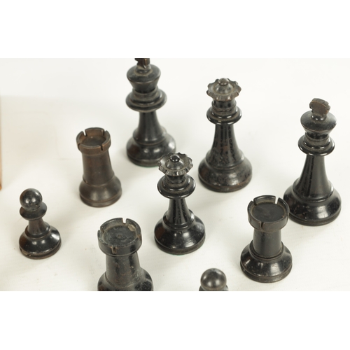 694 - A COLLECTION OF VARIOUS 19TH CENTURY BOXWOOD AND EBONISED CHESS PIECES in a pine box (King measures ... 