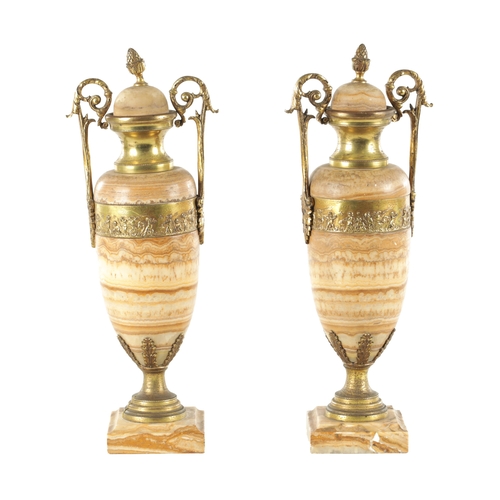 706 - A PAIR OF LATE 19TH CENTURY ITALIAN ALABASTRO FIORITO CASSOLETTES with slender marble bodies and gil... 