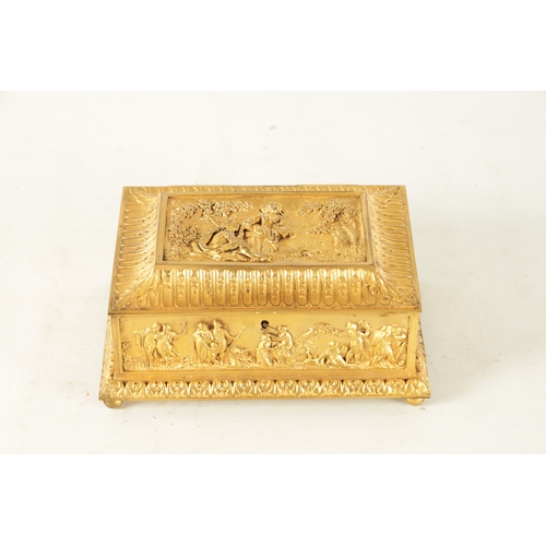 707 - A LATE 19TH CENTURY FRENCH GILT METAL JEWELLERY CASKET with classical figural scenes raised on bun f... 