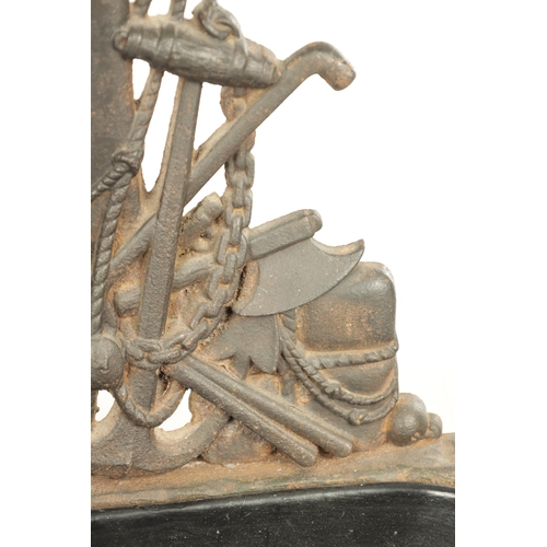 714 - A LATE 19TH CENTURY CAST IRON STICK STAND modelled as a sailor standing over an anchor and flags wit... 