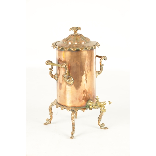 715 - A 19TH CENTURY COPPER CYLINDRICAL KETTLE with brass mounts and shaped legs (35cm high )