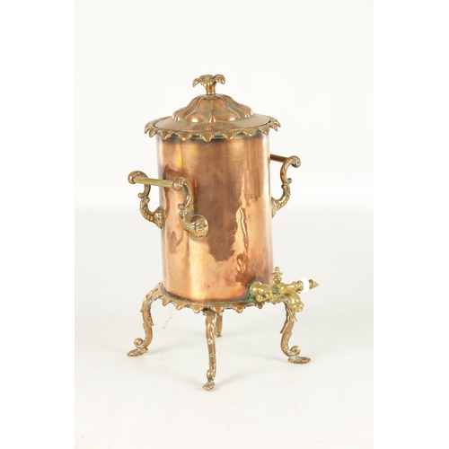 715 - A 19TH CENTURY COPPER CYLINDRICAL KETTLE with brass mounts and shaped legs (35cm high )