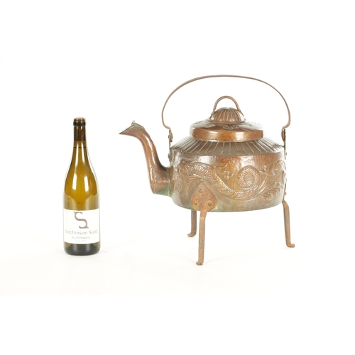 719 - A LARGE ARTS AND CRAFTS COPPER KETTLE with an iron-hinged handle and domed lid, the body decorated w... 