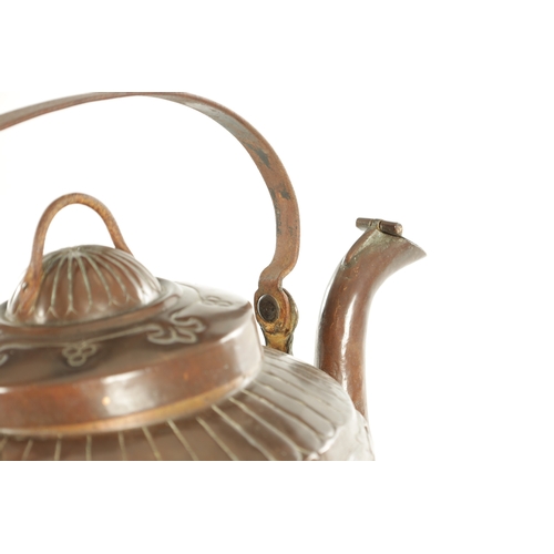 719 - A LARGE ARTS AND CRAFTS COPPER KETTLE with an iron-hinged handle and domed lid, the body decorated w... 