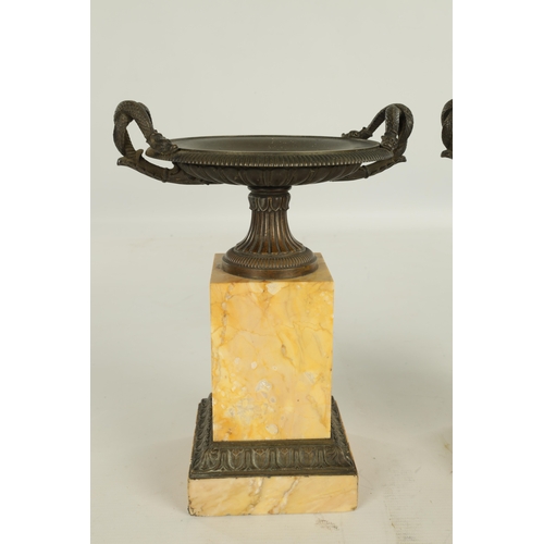 724 - A PAIR OF LATE 19TH CENTURY GRAND TOUR BRONZE AND SIENNA MARBLE TAZZAS with dished tops having serpe... 