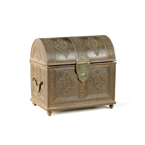 725 - A 19TH CENTURY CAST IRON JEWELLERY CASKET having a hinged domed lid with panelled foliate decoration... 