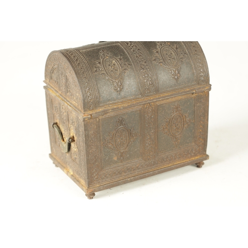 725 - A 19TH CENTURY CAST IRON JEWELLERY CASKET having a hinged domed lid with panelled foliate decoration... 