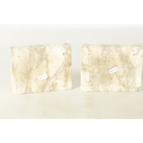 727 - A PAIR OF GRAND TOUR-STYLE WHITE AND SIENNA MARBLE PLAQUES decorated with Roman style armour (16.5cm... 