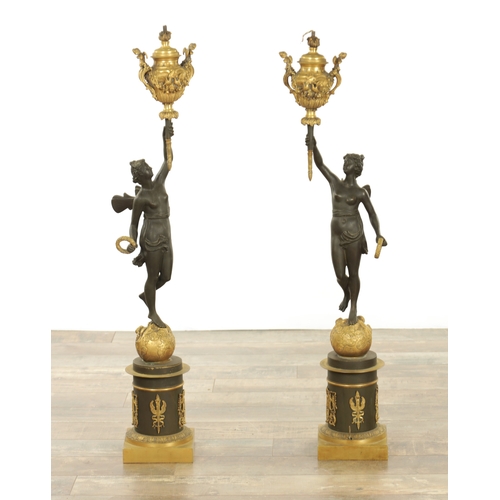 728 - A GOOD PAIR OF REGENCY STYLE BRONZE AND GILT BRONZE FIGURAL LAMP BASES of classical style with stand... 