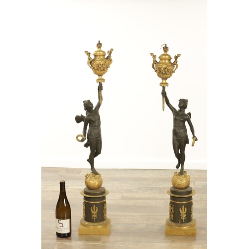 728 - A GOOD PAIR OF REGENCY STYLE BRONZE AND GILT BRONZE FIGURAL LAMP BASES of classical style with stand... 