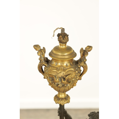 728 - A GOOD PAIR OF REGENCY STYLE BRONZE AND GILT BRONZE FIGURAL LAMP BASES of classical style with stand... 