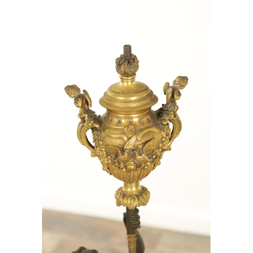 728 - A GOOD PAIR OF REGENCY STYLE BRONZE AND GILT BRONZE FIGURAL LAMP BASES of classical style with stand... 