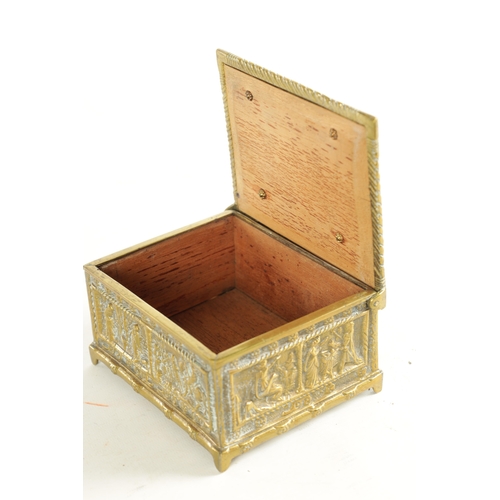 730 - A LATE 19TH CENTURY CONTINENTAL BRASS CASKET with cedar-lined interior and all-round panelled decora... 