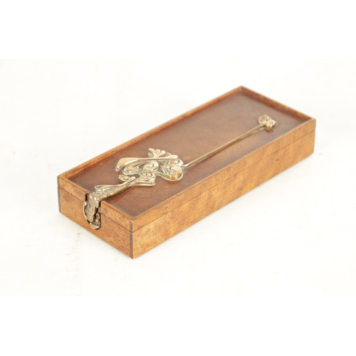 733 - AN ART DECO MIXED MEDIA LIDDED BOX with Mahogany carcass and leather inlaid top fitted with a stylis... 