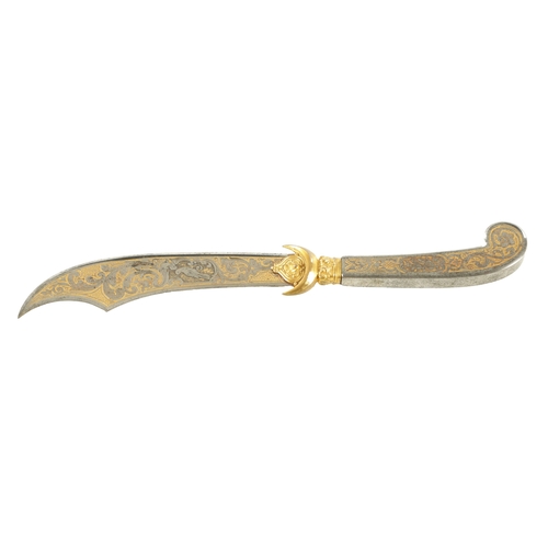 745 - AN EARLY 20TH CENTURY PALAIS ROYAL STEEL AND GOLD ETCHED PAPER KNIFE modelled as a Cretan dagger fin... 