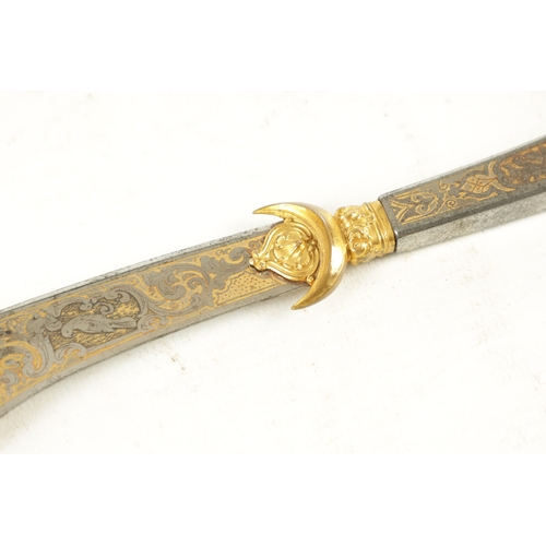 745 - AN EARLY 20TH CENTURY PALAIS ROYAL STEEL AND GOLD ETCHED PAPER KNIFE modelled as a Cretan dagger fin... 