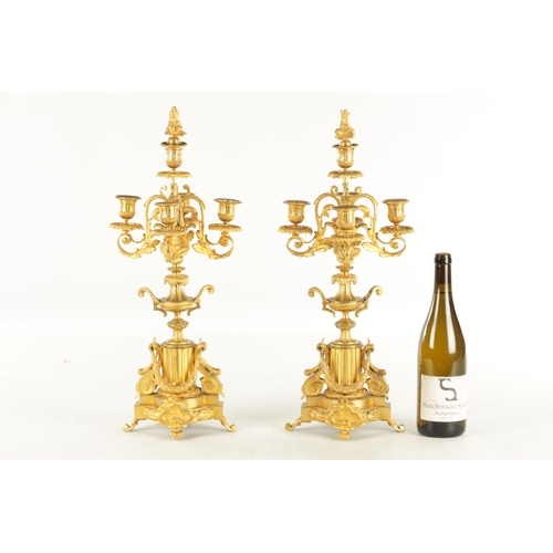 748 - A PAIR OF LATE 19TH CENTURY FRENCH ORMOLU CANDELABRA with five leaf work branches raised on urn-shap... 