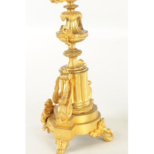 748 - A PAIR OF LATE 19TH CENTURY FRENCH ORMOLU CANDELABRA with five leaf work branches raised on urn-shap... 